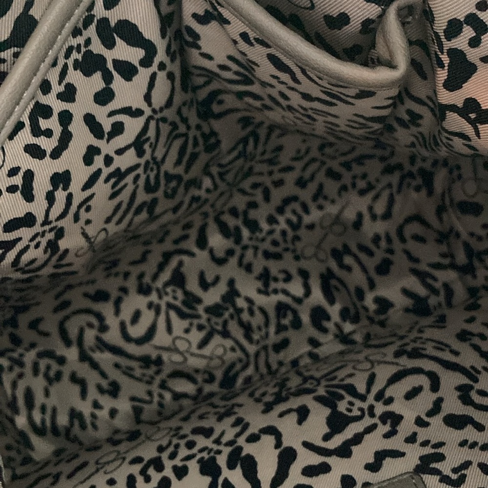 Jessica Simpson Bag with Studs and signature feather. - Picture 10 of 14